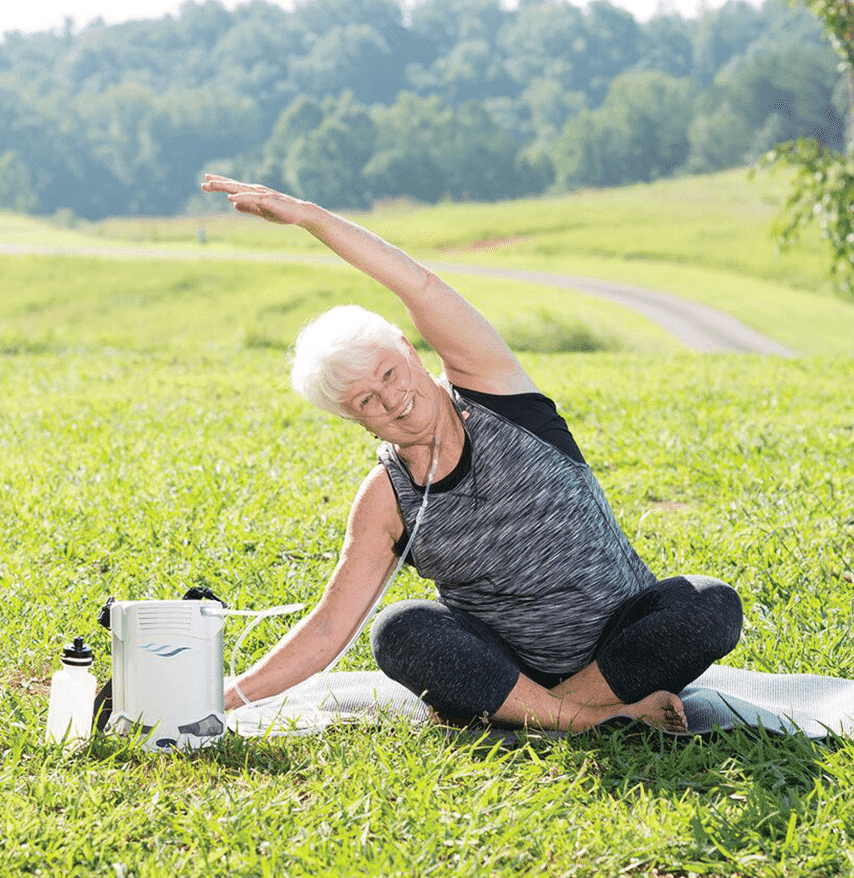 Woman practicing yoga with the Caire Freestyle Comfort